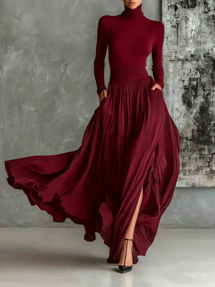 Fashionable set of a black, fitted turtleneck and a pleated skirt