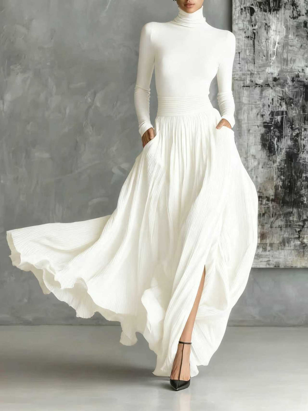 Fashionable set of a black, fitted turtleneck and a pleated skirt